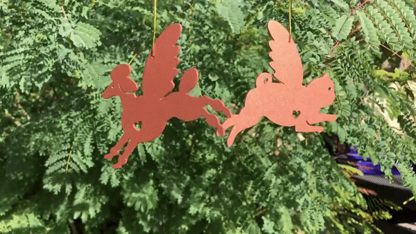 Poodle and pug ornament